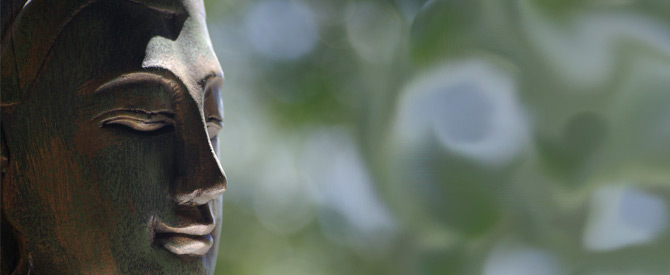 smiling Buddha Statue showing a peaceful mind