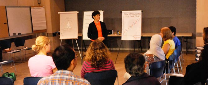 Manisha Melwani speaking in front of audience