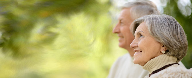 smiling elderly couple