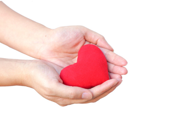 hands offering love as an example of give and serve