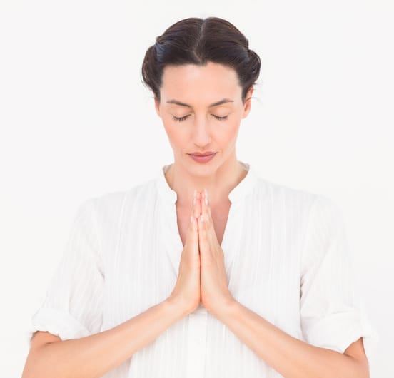 Woman praying to the Self as the highest spiritual discipline
