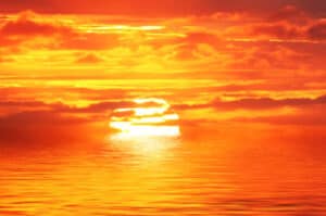 radiant red-gold sunrise that helps us recognize God