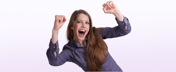 Exhilarated woman with fists up illustrating transform how to see your life