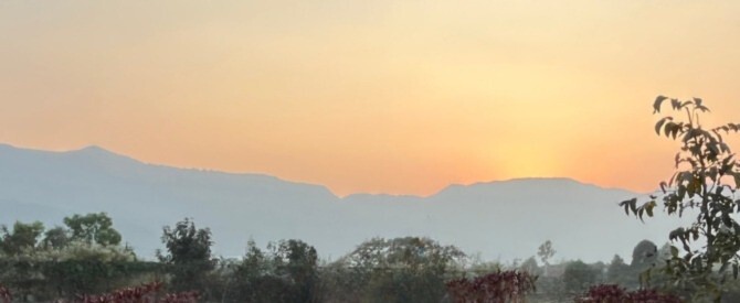 Sunset behind the mountains symbolizing find the goal on your spiritual path