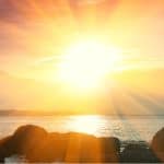 Beautiful sunrise with rocks in foreground symbolising how to build a relationship with God